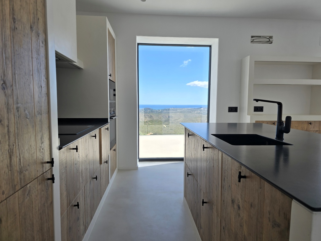 NEUE LUXUSVILLA ZUM VERKAUF mit herrlichem Blick auf das Meer und Ibiza