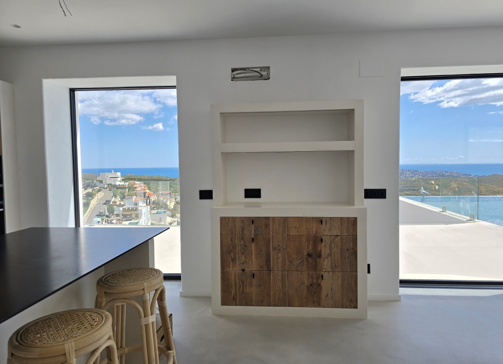 NEUE LUXUSVILLA ZUM VERKAUF mit herrlichem Blick auf das Meer und Ibiza