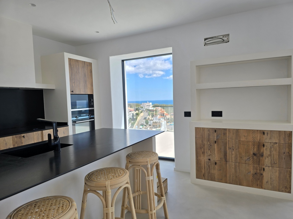 NEUE LUXUSVILLA ZUM VERKAUF mit herrlichem Blick auf das Meer und Ibiza