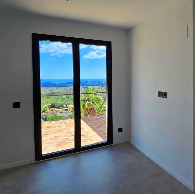NEUE LUXUSVILLA ZUM VERKAUF mit herrlichem Blick auf das Meer und Ibiza
