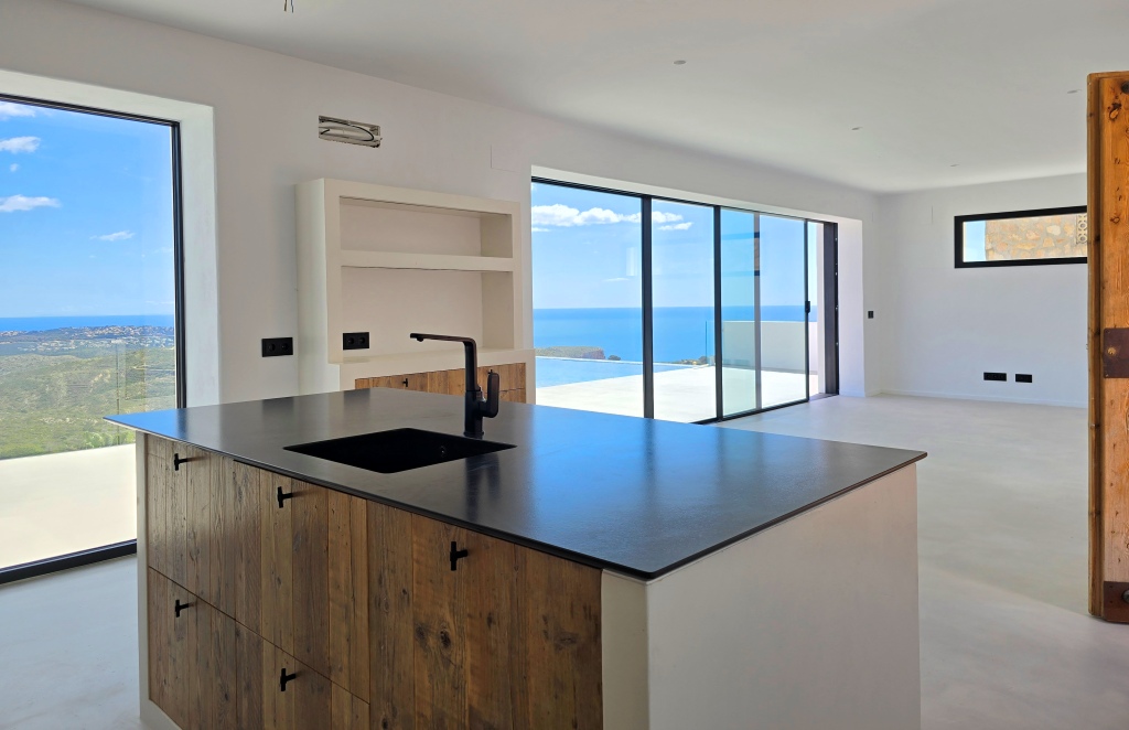 NEUE LUXUSVILLA ZUM VERKAUF mit herrlichem Blick auf das Meer und Ibiza